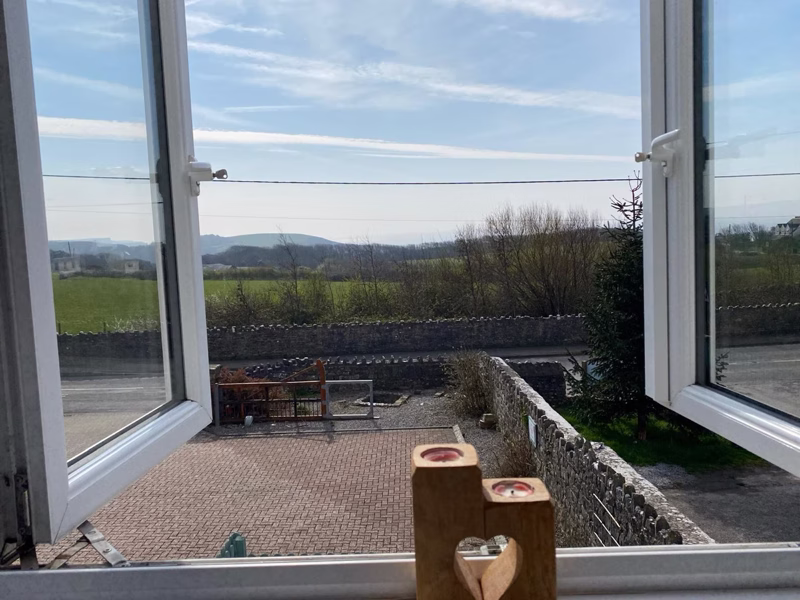 Sea Dream Lodge — countryside view through the bedroom window