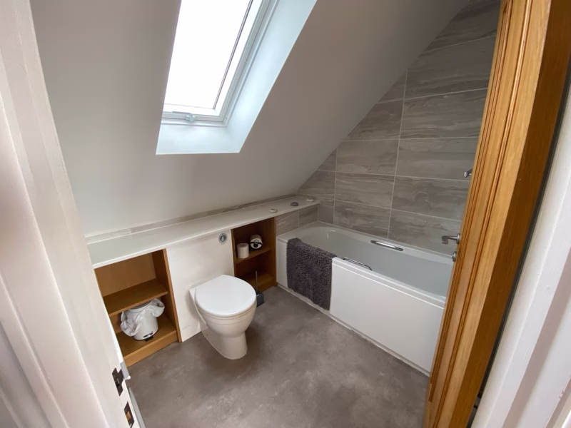 Sea Dream Lodge — bathroom with freestanding bath and skylight